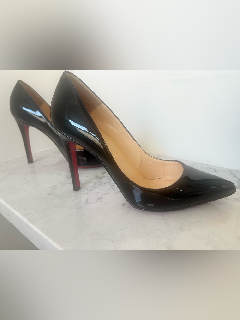 Christian Louboutin Black Patent Leather Pumps with Signature Red Sole
